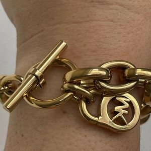 MK Michael Kors gold tone logo charms toggle clasp bracelet